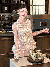 Model wearing a white sleeveless Cheongsam vest with pink floral embroidery, sequins, and a ruffled hem, holding a tea cup, crafted from 100% polyester.