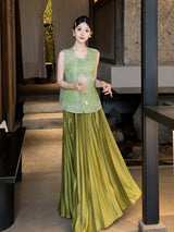 Model in a green embroidered Cheongsam vest with floral details, holding a fan and standing indoors, showcasing the 100% polyester fabric.