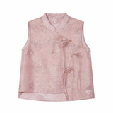 Flat lay of a pink sleeveless embroidered vest with a mandarin collar, floral embroidery, and side tie details.