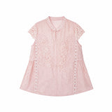 Flat lay of a pink lace-trimmed Cheongsam top with a mandarin collar, delicate floral embroidery, and short lace sleeves, crafted from 80% Viscose, 20% Polyamide.