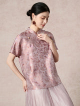 Close-up of a purple 100% mulberry silk Cheongsam top featuring a delicate stand collar and a traditional frog button closure.