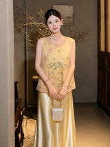 Model in a yellow sleeveless embroidered vest with a mandarin collar, holding a handbag, highlighting the intricate embroidery and elegant silhouette.